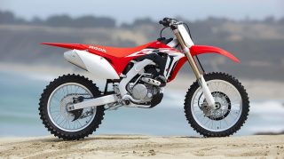 Thrilling Honda Dirt Bike Mobile Wallpaper for LG Phones