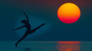 Premium Stock Photos: Beach Sunset with Gymnast