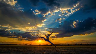 Free Stock Photos of Gymnast in Beautiful Sunset