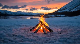 Experience a Winter Campfire with Free Wallpaper